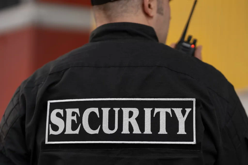 Professional man guarding company protecting commercial properties in the UK
